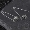 Grotesque Pin Stainless Steel Skull Earrings sold by GTHIC