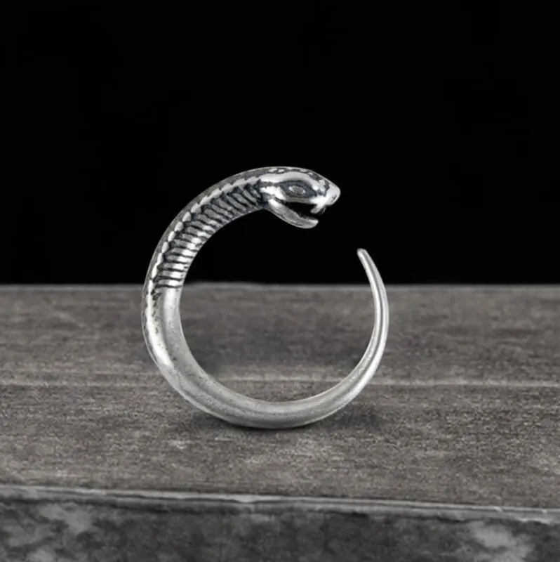 Vintage Snake-Shaped Sterling Silver Hoop Earrings sold by GTHIC