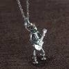 Playing Guitar Sterling Silver Skull Pendant sold by GTHIC