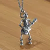 Playing Guitar Sterling Silver Skull Pendant sold by GTHIC
