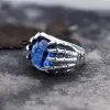 Dragon Eye Stainless Steel Skull Claw Ring sold by GTHIC
