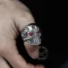 Ruby & Sapphire Eye Stainless Steel Skull Ring sold by GTHIC
