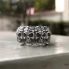 Surrounded Titanium Sterling Silver Skull Ring sold by GTHIC