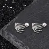 Skull Hand Stainless Steel Piercing Earrings sold by GTHIC