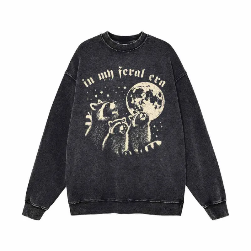 In My Feral Era Raccoon and Moon Vintage Washed Sweatshirt sold by GTHIC
