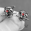 Gothic Skull Pirate Biting Sword Stainless Steel Earrings sold by GTHIC