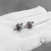 Gothic Skull Pirate Biting Sword Stainless Steel Earrings sold by GTHIC