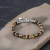 Simple Tiger Eye Stone Beaded Stainless Steel Bracelet sold by GTHIC