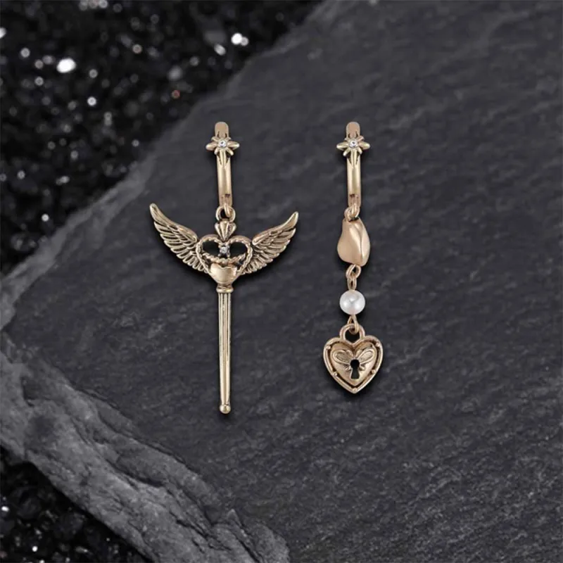 Simple Asymmetrical Cupid Wing Alloy Earrings sold by GTHIC