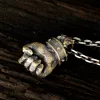 Powerful Fist of Fate Sterling Silver Brass Pendant sold by GTHIC