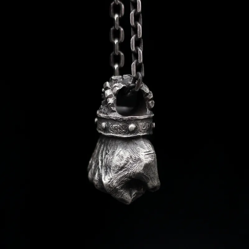 Powerful Fist of Fate Sterling Silver Brass Pendant sold by GTHIC