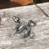 Snake Vertebrae Bone Stainless Steel Skull Ring sold by GTHIC