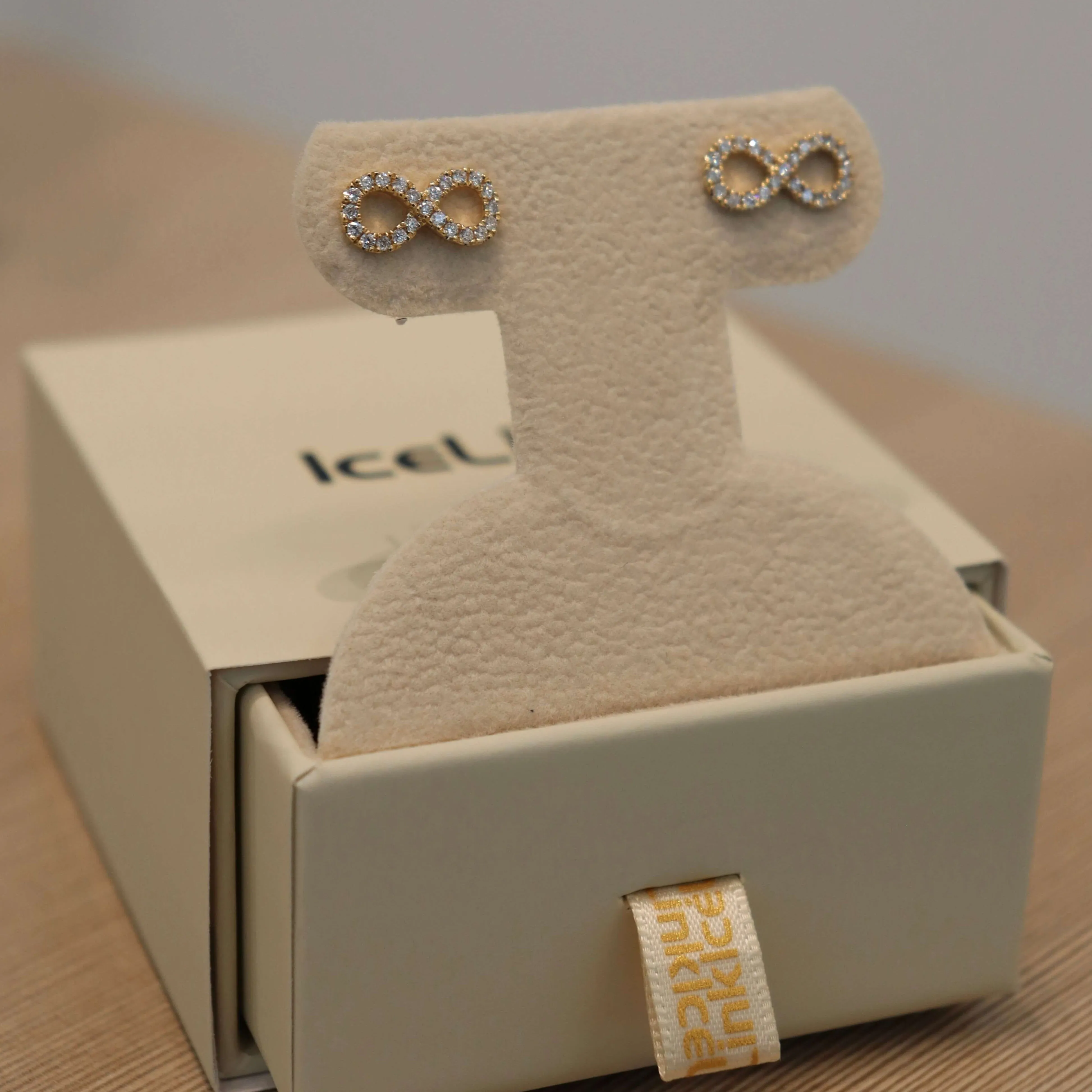 14K Infinity Diamond Studs (Sample Sale) sold by IceLink