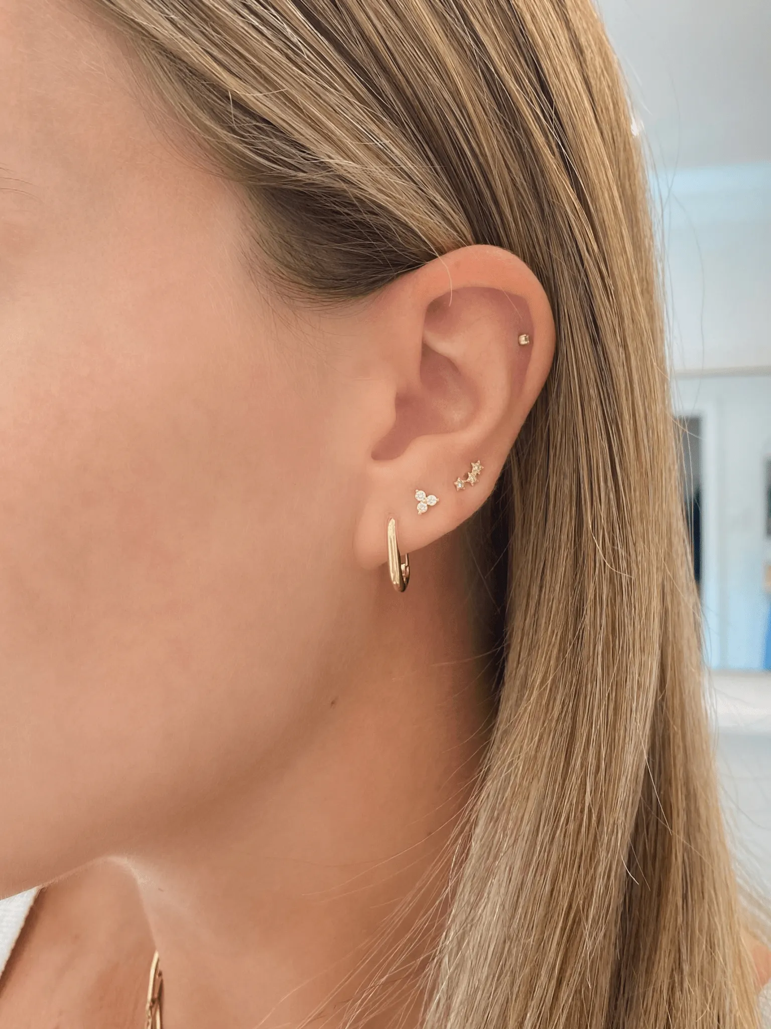 Oval Hoop Huggie Earrings 14K sold by LeMel product image thumbnail 5