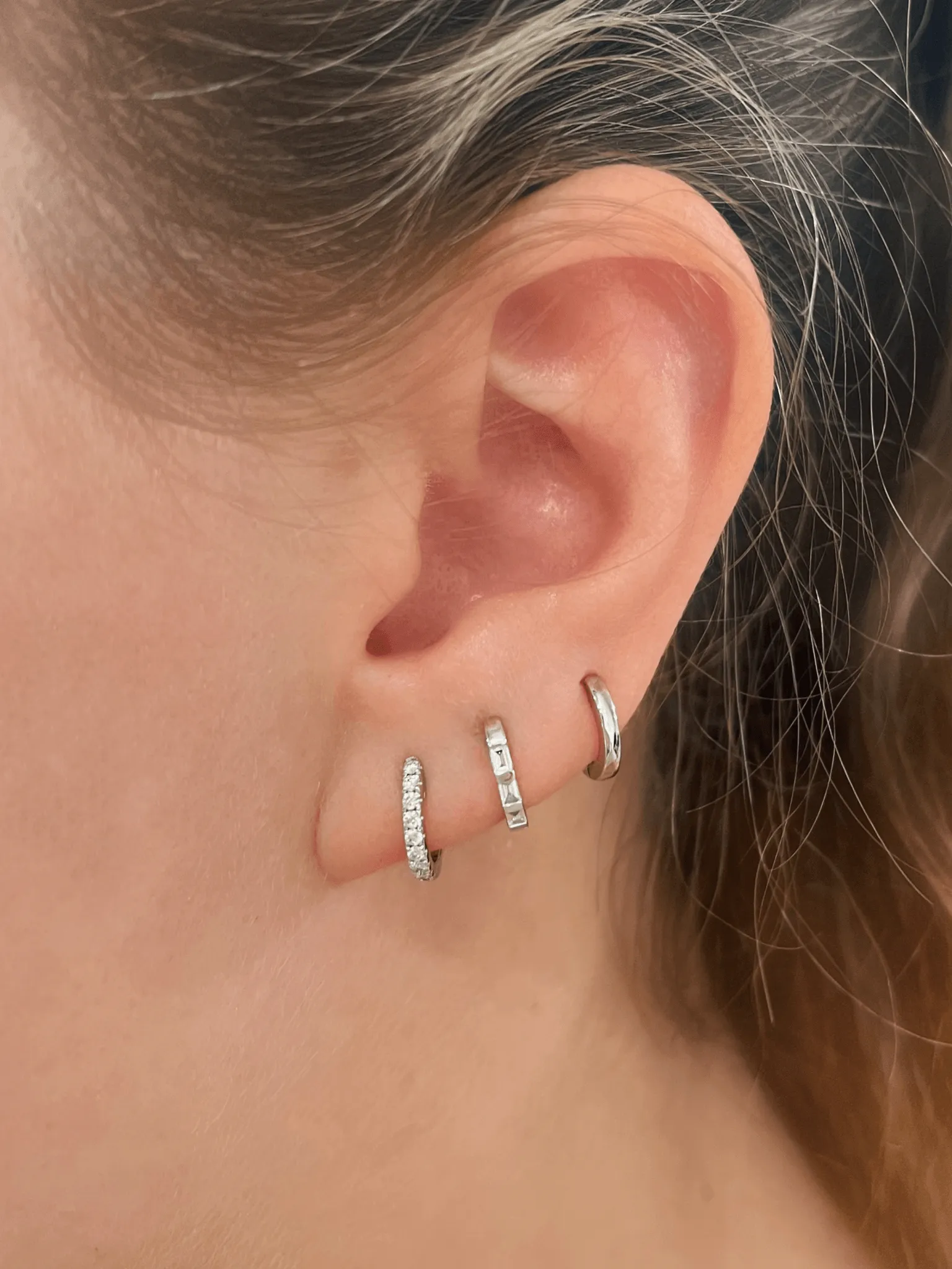 Gold Huggie Earrings 14K sold by LeMel product image thumbnail 4