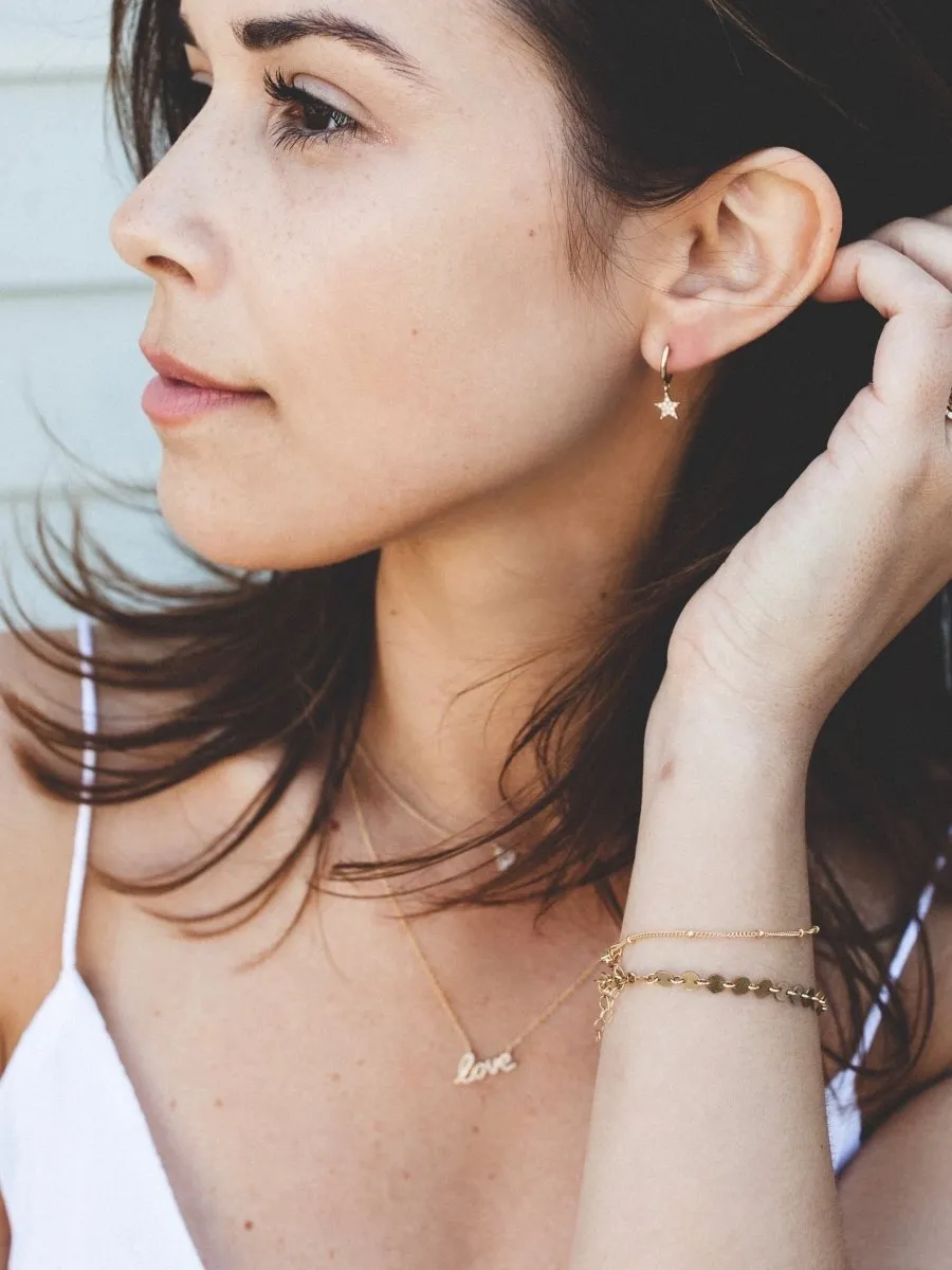 Brette Star Huggie Earrings 14K sold by LeMel product image thumbnail 2