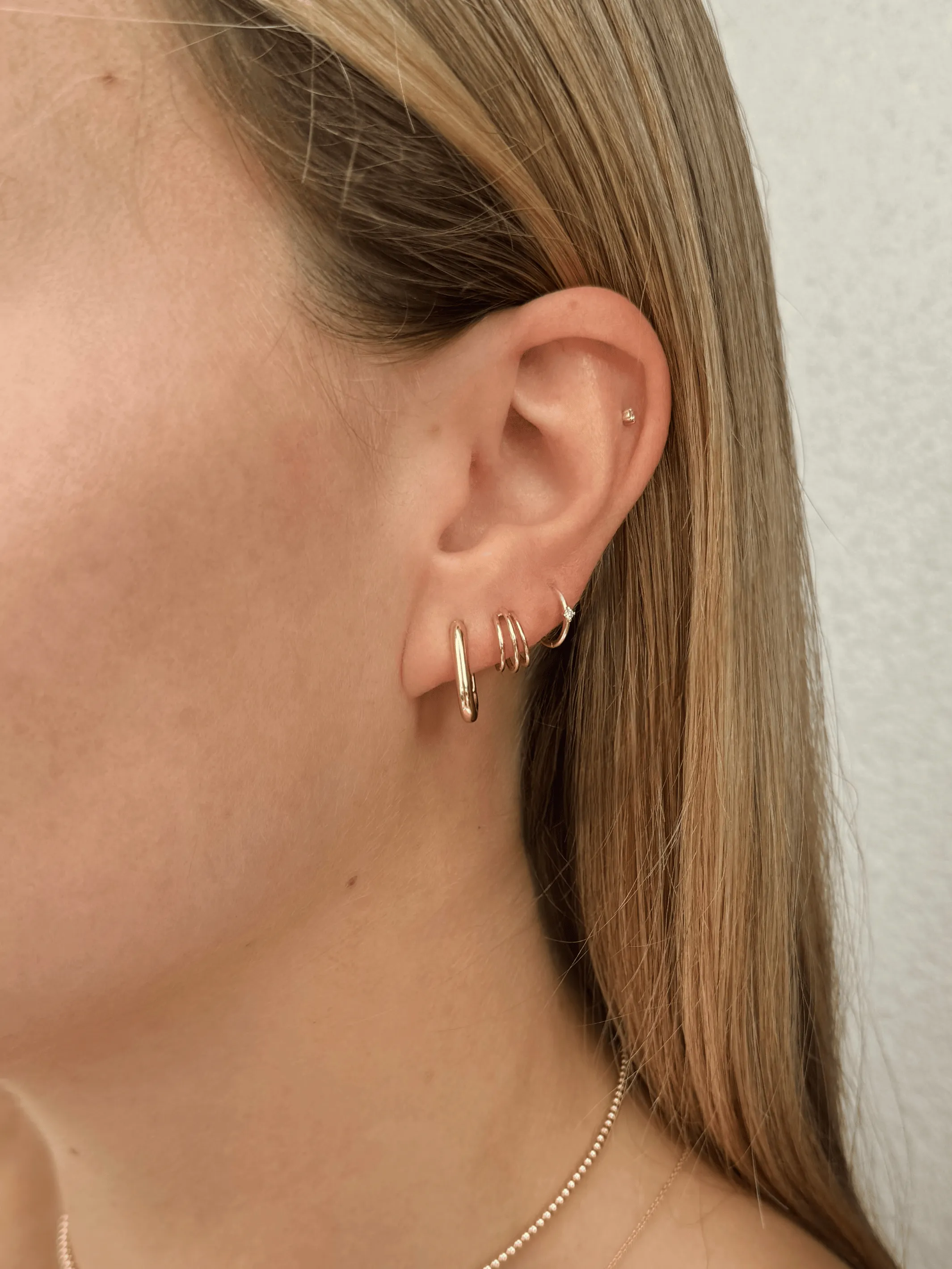 Triple Hoop Huggie Earrings 14K sold by LeMel product image thumbnail 3