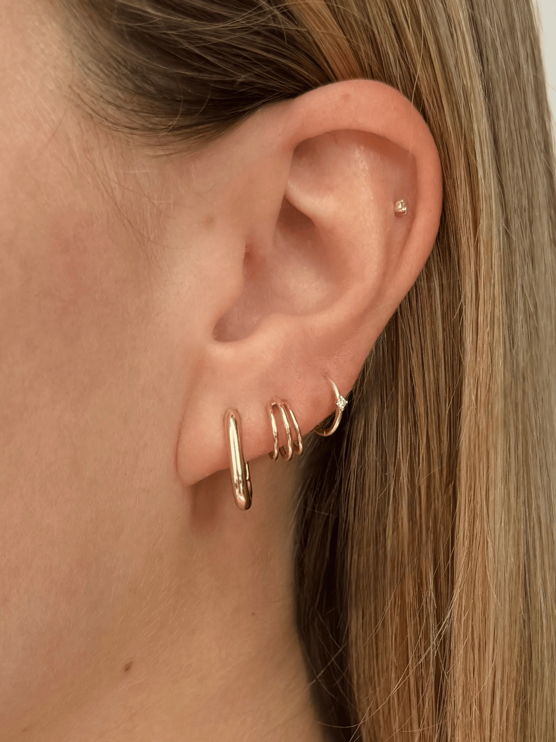 Triple Hoop Huggie Earrings 14K sold by LeMel product image thumbnail 2