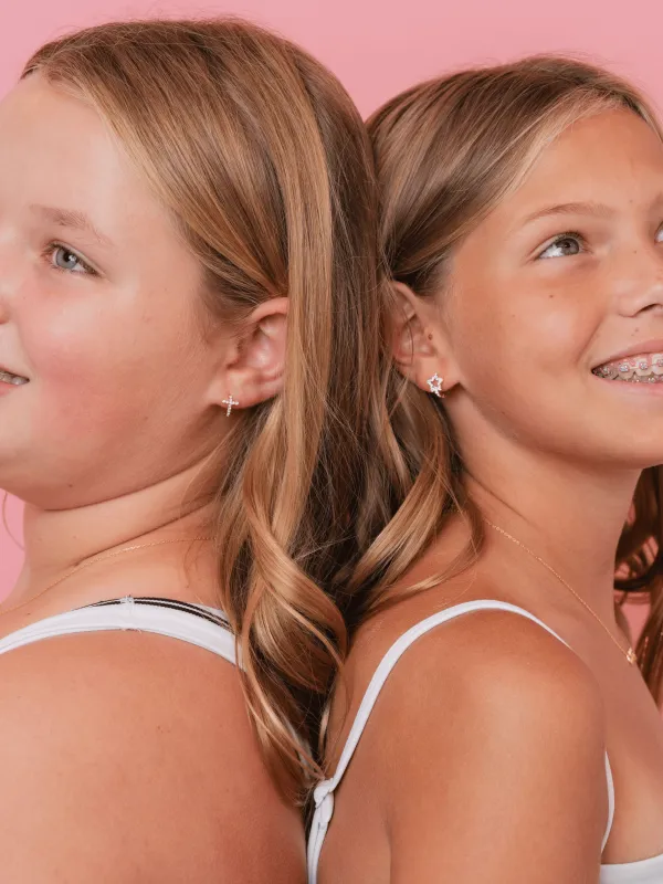 Cross CZ Huggie Earrings sold by LeMel