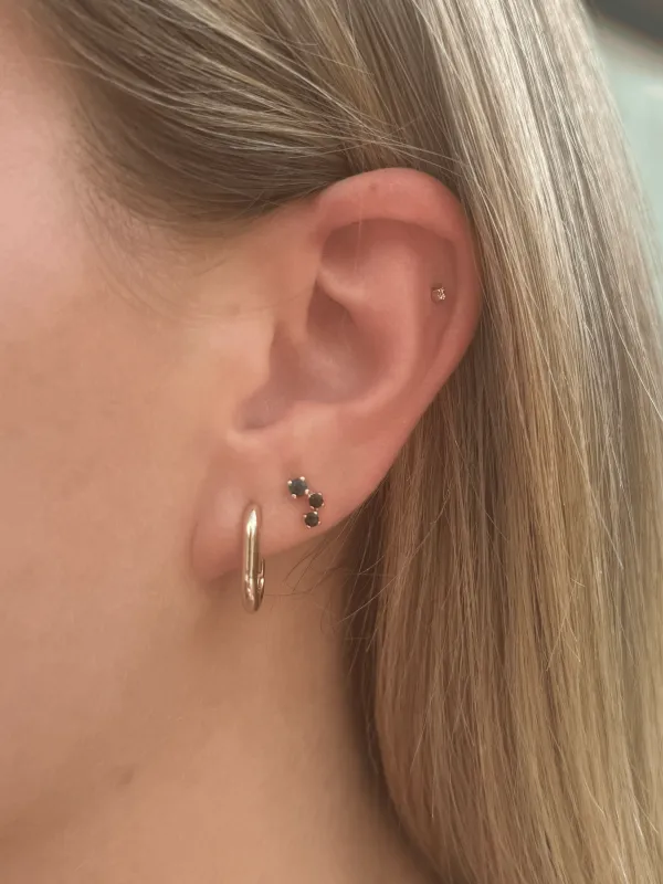 Curved Trio Stud 14K sold by LeMel