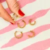 Low Tide Hoops sold by Ariel Gordon Jewelry