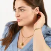 Baguette Diamond Huggies sold by Ariel Gordon Jewelry