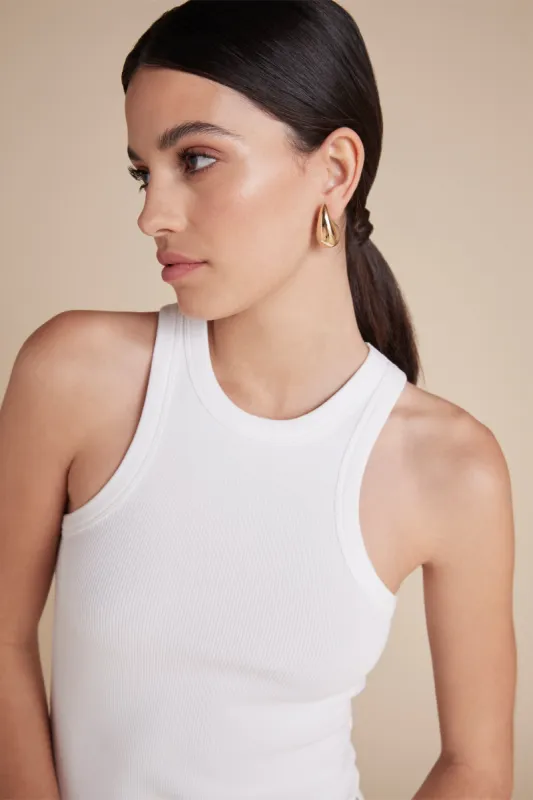 The Racerback Tank in White sold by Sold Out NYC