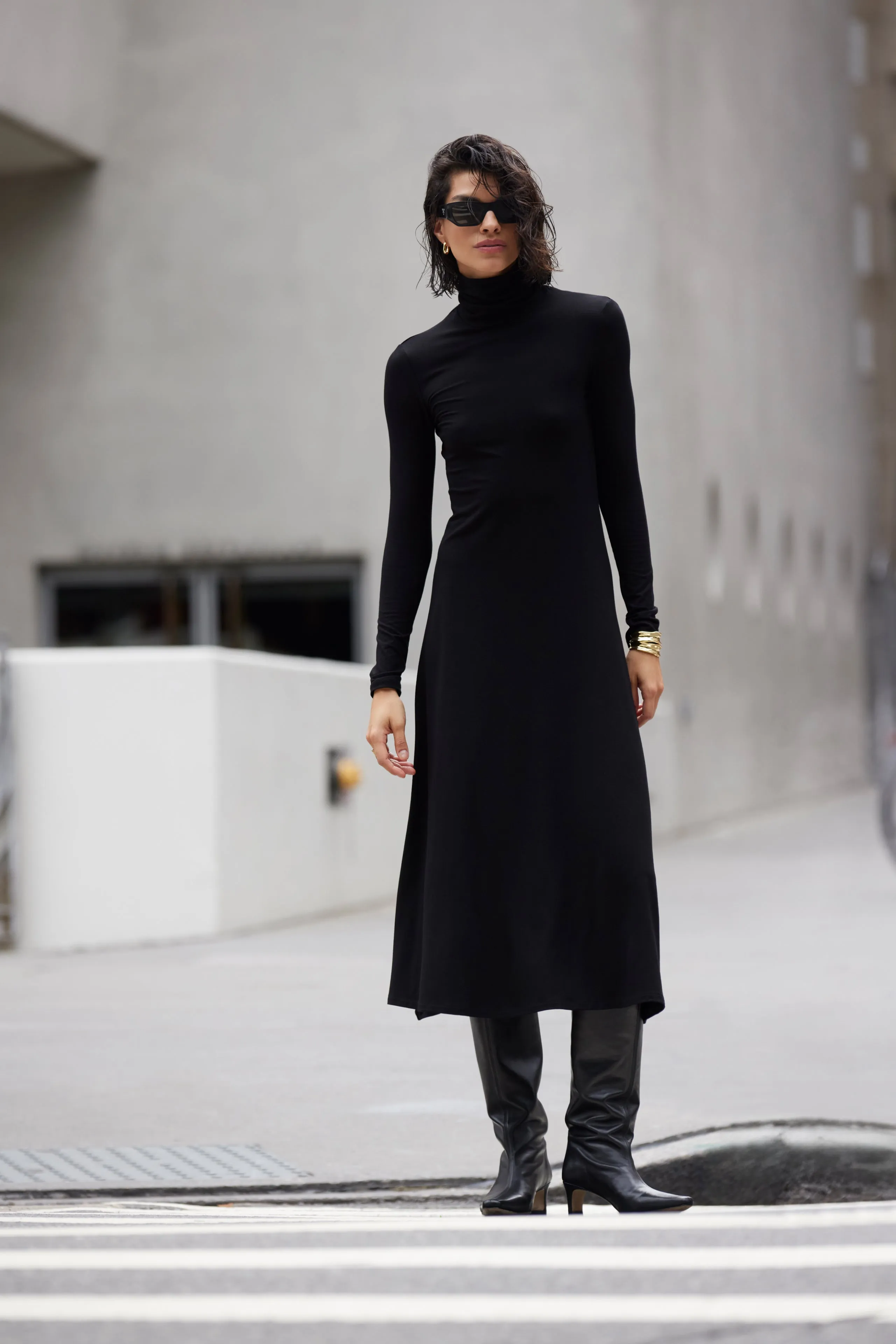 The Turtleneck Dress in Black sold by Sold Out NYC