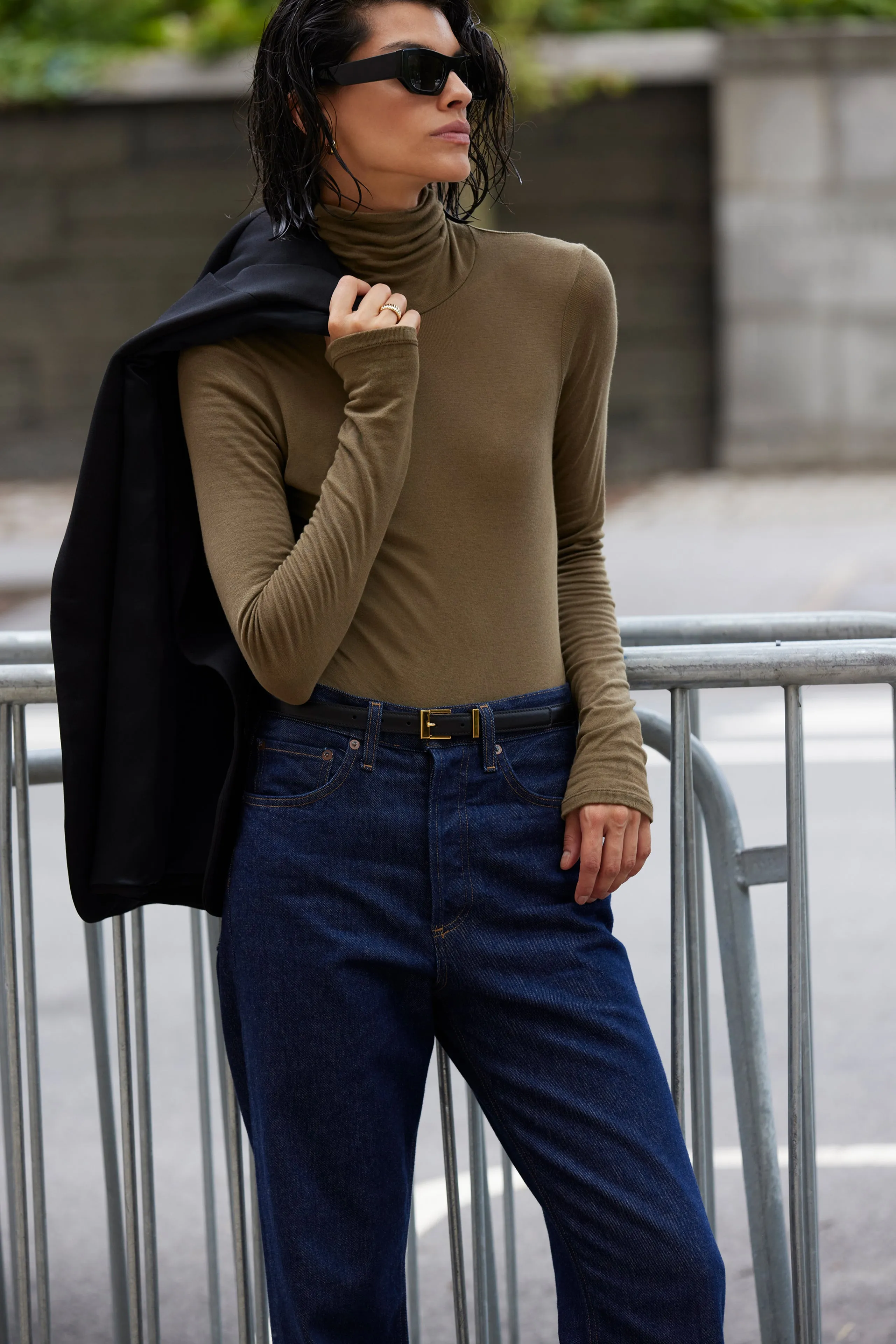 The Cashmere Turtleneck in Olive sold by Sold Out NYC