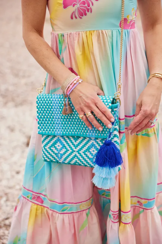 Clutch - Aqua Blue Flower Citron sold by Squeeze De Citron