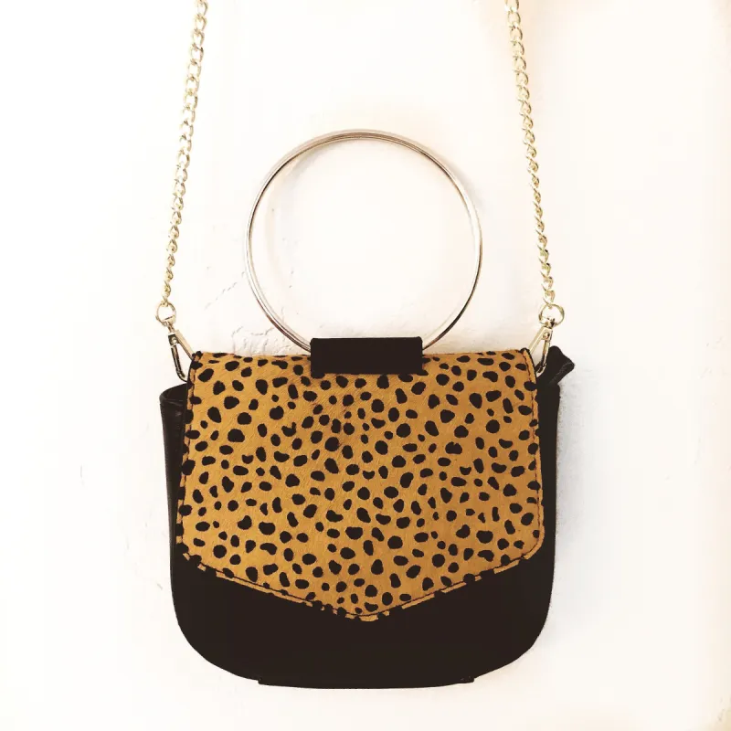 The Circle Cowhide Bag sold by The Sis Kiss