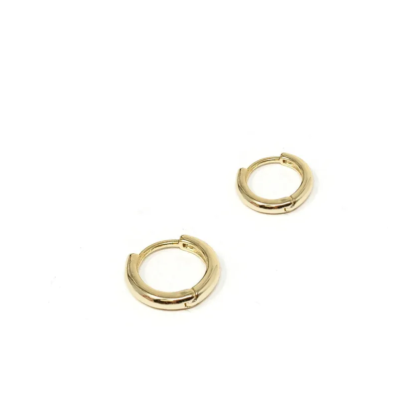 The Mars Huggie Earrings sold by The Sis Kiss