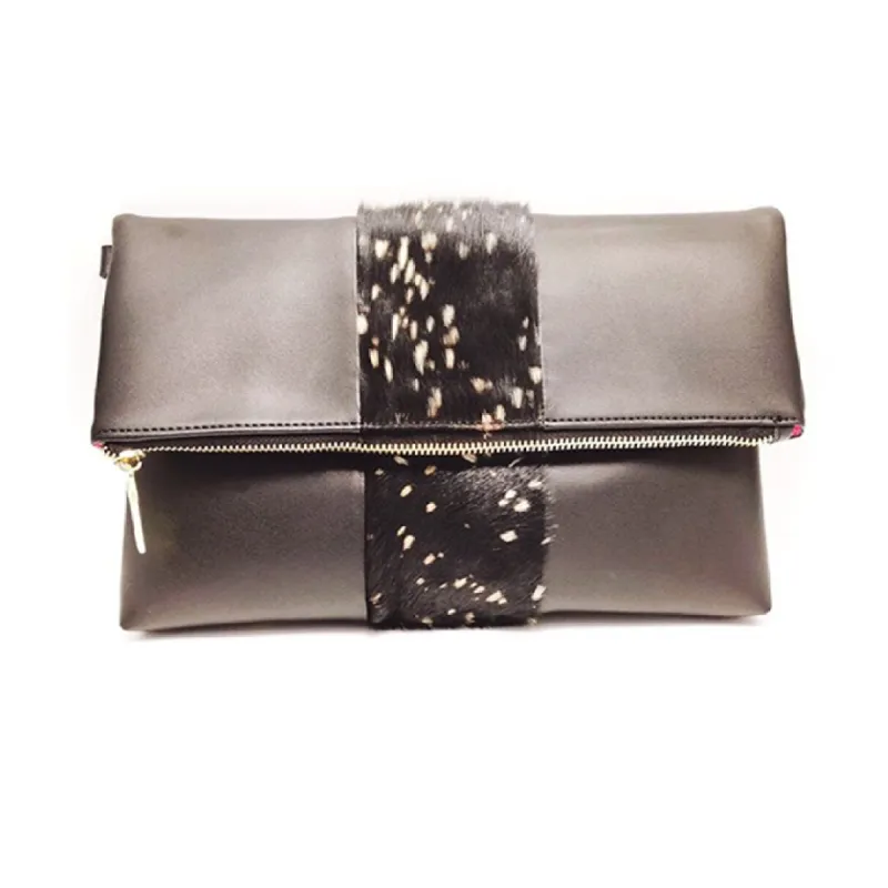The Hair on Hide Clutch sold by The Sis Kiss