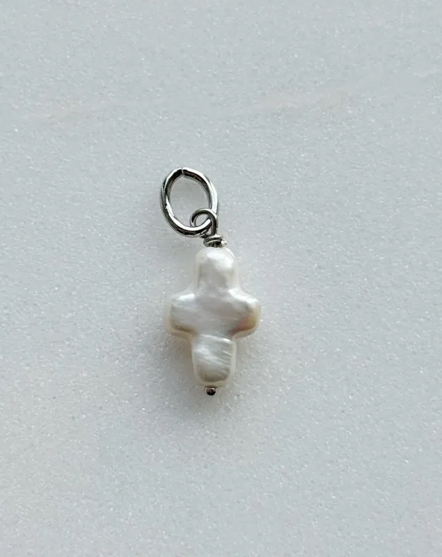 Natural Pearl Cross Charm sold by The Sis Kiss
