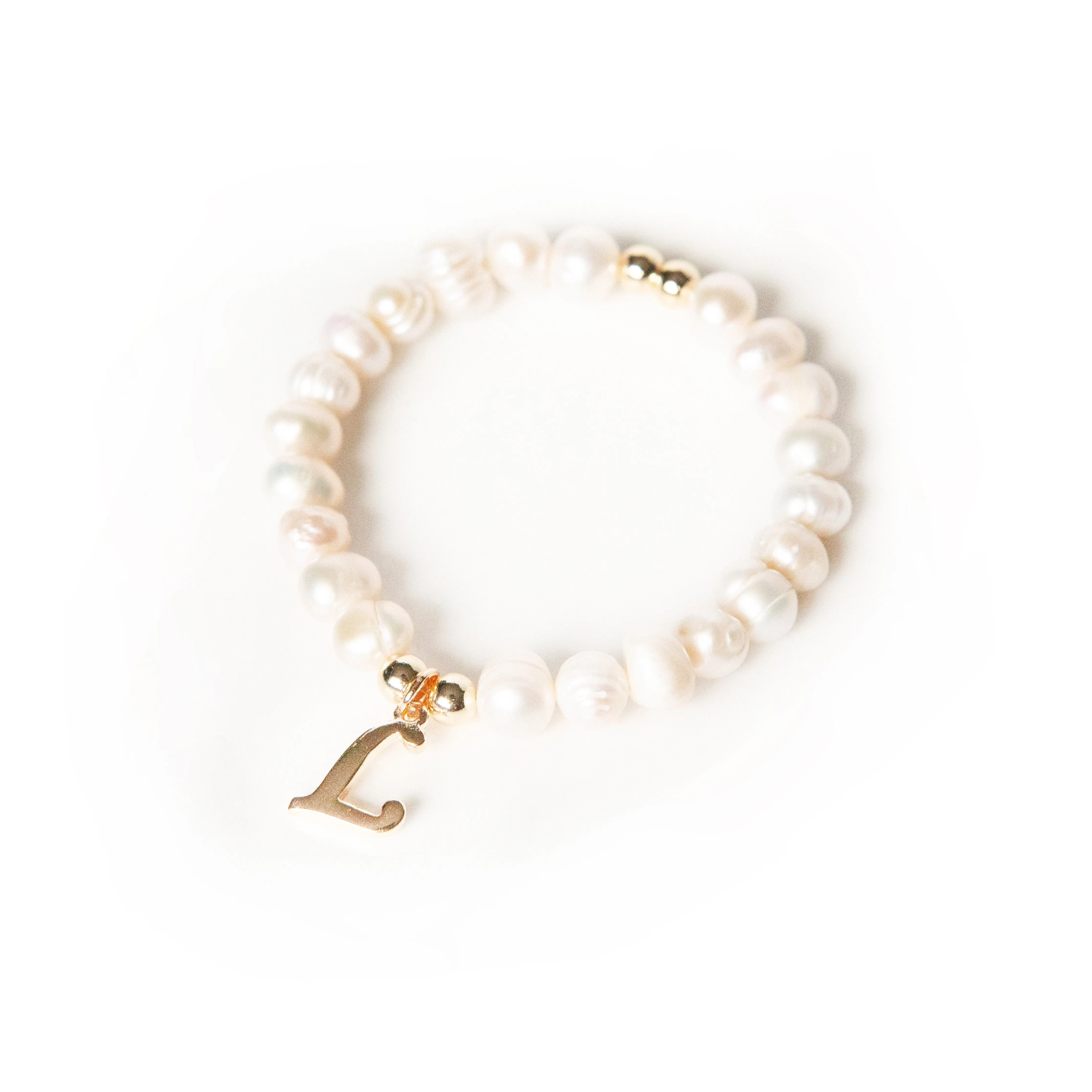 Initial Charm Pearl Stretch Bracelet sold by The Sis Kiss