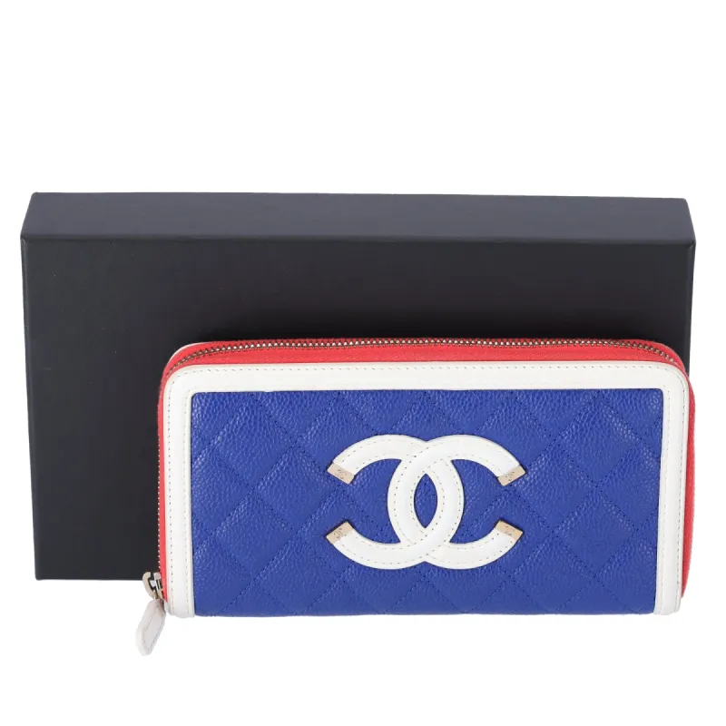 CHANEL Caviar Quilted Medium Filigree Zip Around Wallet Blue White Red sold by Gaby's Bags