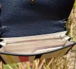 Kate Spade Roulette Canvas Stripe Top Handle Crossbody Multi Color Stripe sold by Gaby's Bags