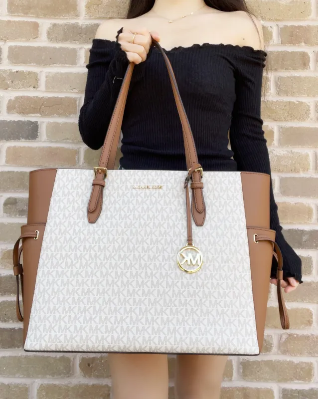 Michael Kors Gilly Large JetSet Travel DrawstringTote Vanilla sold by Gaby's Bags