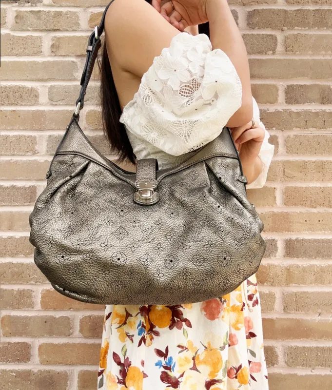 Louis Vuitton XS Shoulder Bag Crossbody M95717 Monogram Mahina Bronze Perforated sold by Gaby's Bags