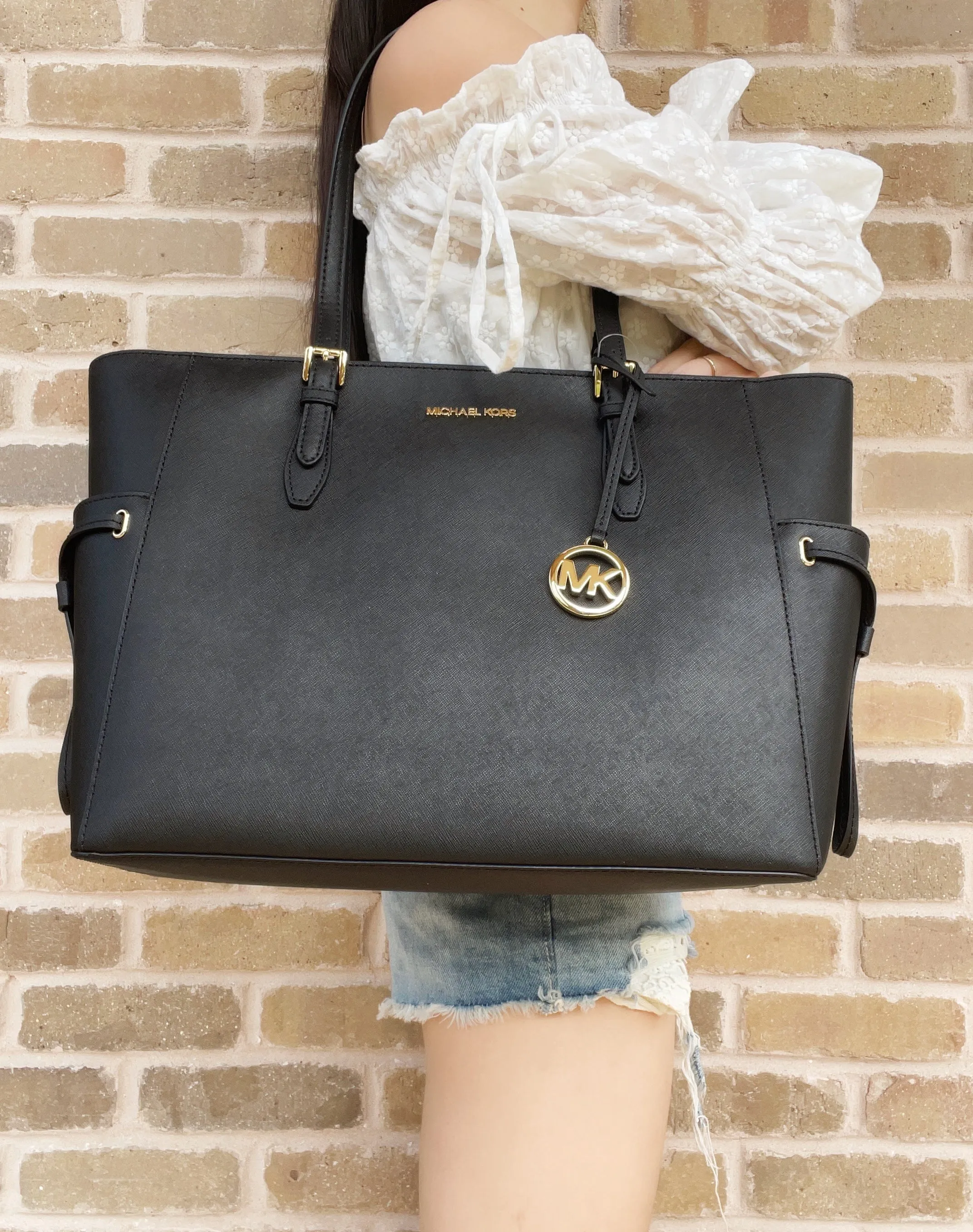 Michael Kors Gilly Large Jet Set Drawstring Top Zip Tote Black Saffiano Leather sold by Gaby's Bags product image thumbnail 2