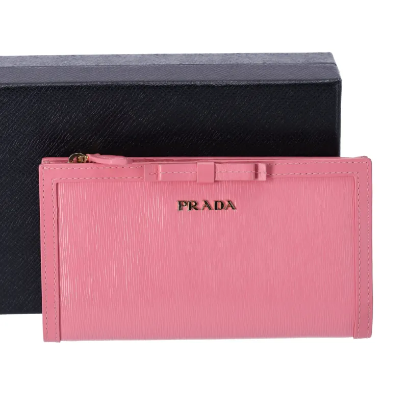 Prada Long Bifold Wallet Ribbon Pink Saffiano Leather sold by Gaby's Bags