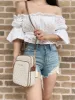 Michael Kors FlightBag JetSet Chain NorthSouth Crossbody Vanilla MKSignature sold by Gaby's Bags