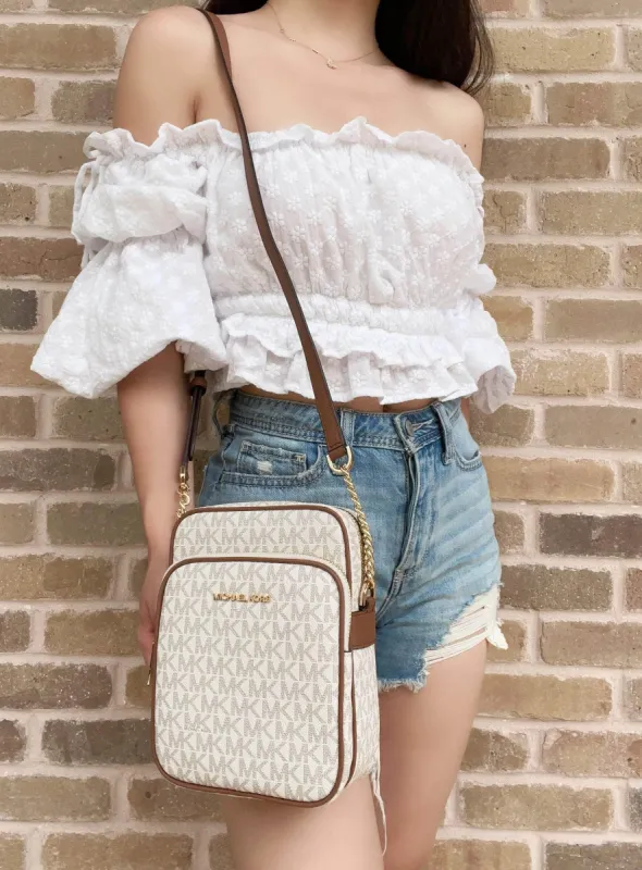 Michael Kors FlightBag JetSet Chain NorthSouth Crossbody Vanilla MKSignature sold by Gaby's Bags