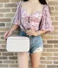Michael Kors Jet Set East West Chain Crossbody Vanilla MK Powder Blush Pink sold by Gaby's Bags
