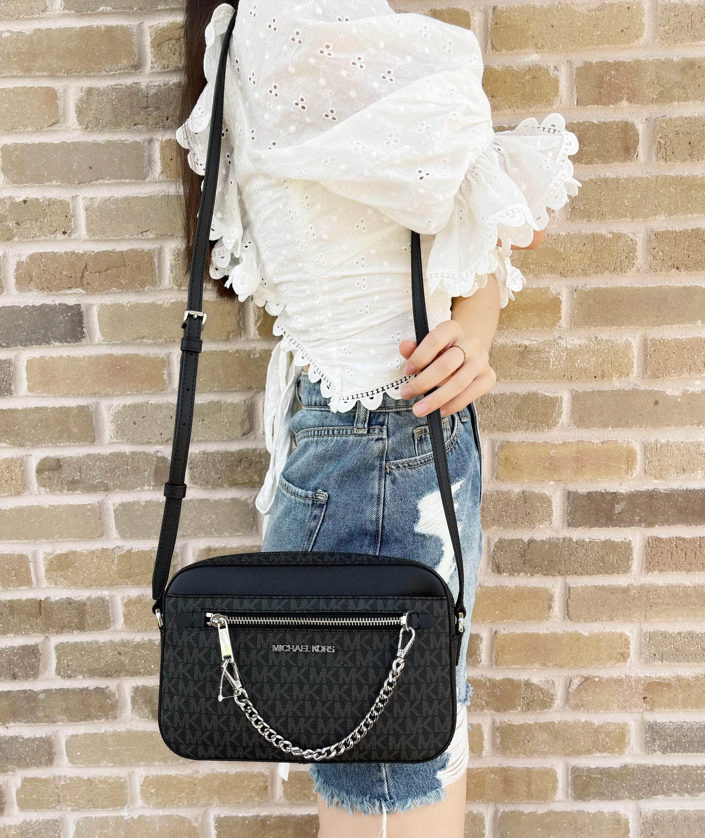 Michael Kors Jet Set Chain East West Large Crossbody Black MK Signature sold by Gaby's Bags