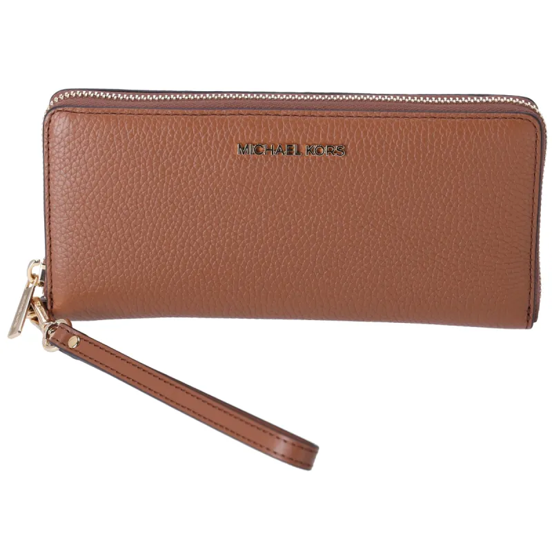 Michael Kors Jet Set Travel Large Continental Pebbled Leather Wallet Luggage sold by Gaby's Bags