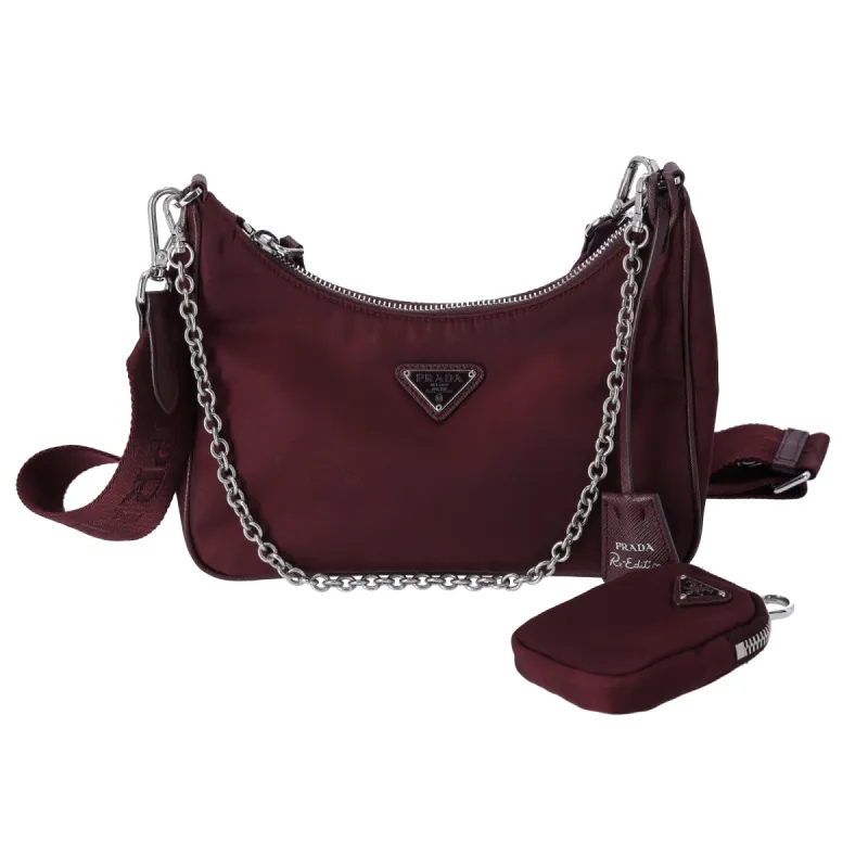 PRADA Re-Edition 2005 Shoulder Bag 1BH204 Bordeaux Nylon Saffiano Leather sold by Gaby's Bags