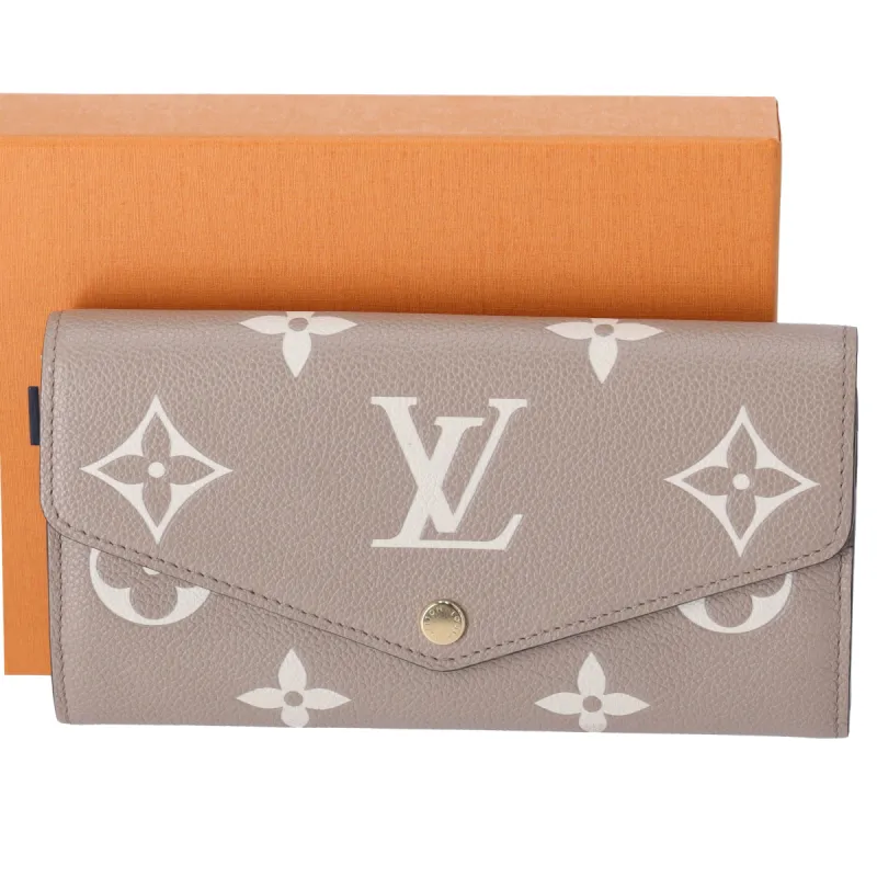 Louis Vuitton Sarah Wallet Bicolor Monogram Empreinte Leather Gray Cream sold by Gaby's Bags