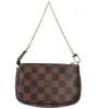Louis Vuitton Mini Pochette Accessoires Damier Ebene Trunks Handbag N58011 sold by Gaby's Bags