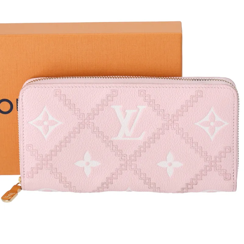 Louis Vuitton Zippy Wallet Monogram Empreinte Broderie M81138 Pink sold by Gaby's Bags